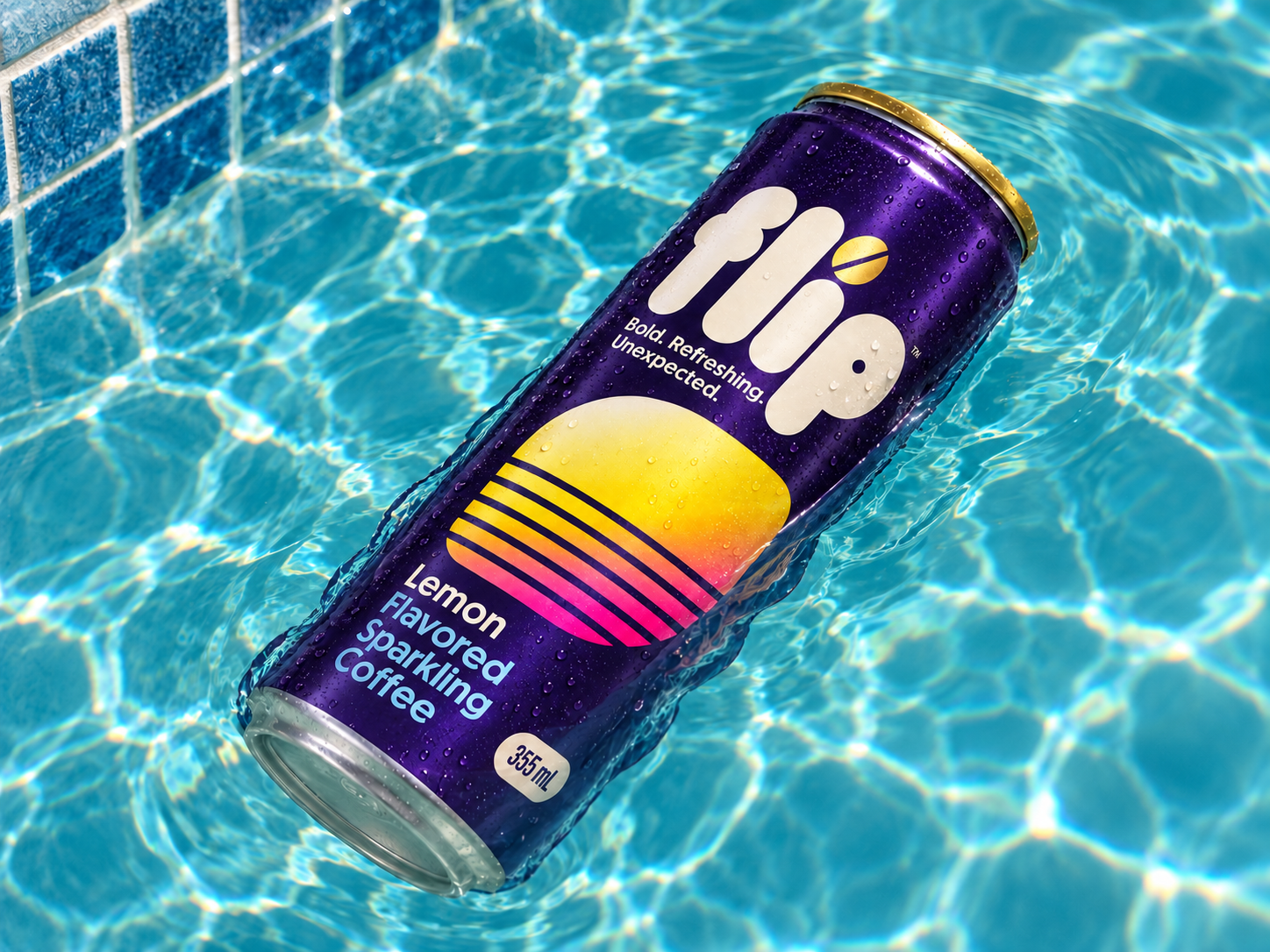 A purple FLIP Lemon can floating in sunlit blue pool water